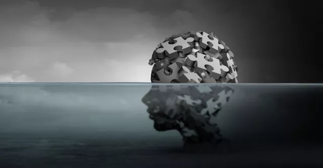 Head made of puzzle pieces