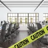 Empty office with caution tape