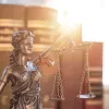 Scales of justice in front of law books