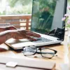 Worker typing on laptop in home office